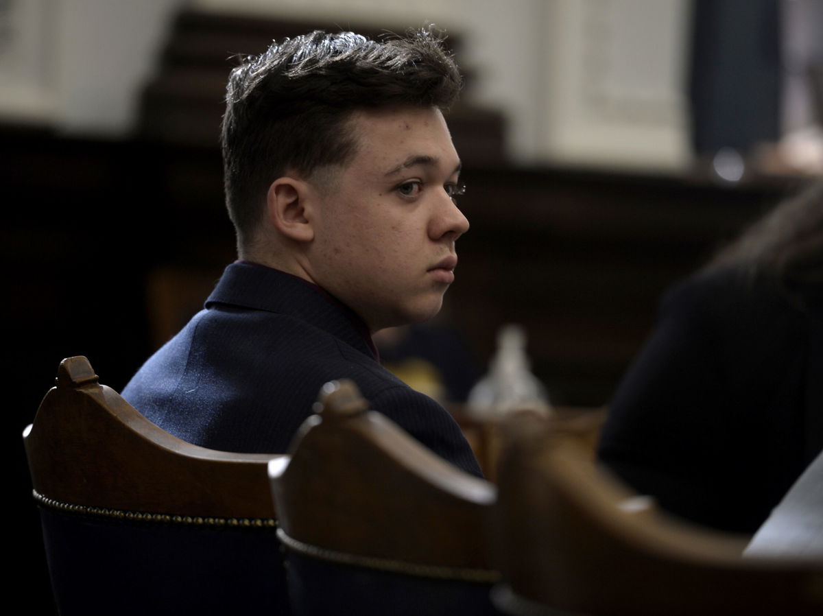 <i>Sean Krajacic/Kenosha News/Pool/Getty Images</i><br/>Kyle Rittenhouse listens as his lawyer gives opening statements to the jury at the Kenosha County Courthouse in Kenosha