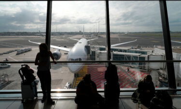 Passengers wait to board on a United Airlines flight