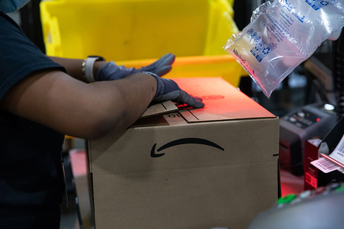<i>Rachel Jessen/Bloomberg/Getty Images</i><br/>Amazon is lifting a mask mandate for warehouse workers fully vaccinated against Covid-19 beginning November 2.