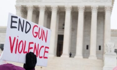 The Supreme Court will take the bench on November 3 to discuss gun rights. Supporters of gun control and firearm safety are seen here outside the US Supreme Court in December 2019.