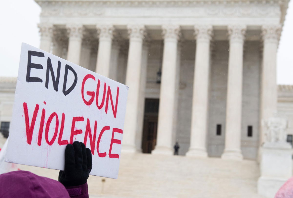 <i>SAUL LOEB/AFP/Getty Images</i><br/>The Supreme Court will take the bench on November 3 to discuss gun rights. Supporters of gun control and firearm safety are seen here outside the US Supreme Court in December 2019.