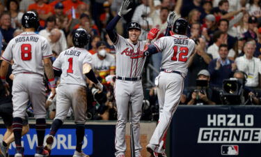 Jorge Soler of the Atlanta Braves is congratulated after hitting a three run home run against the Houston Astros during the third inning in Game Six of the World Series.