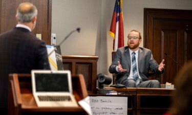 Travis McMichael speaks from the witness stand during his trial Wednesday in Brunswick