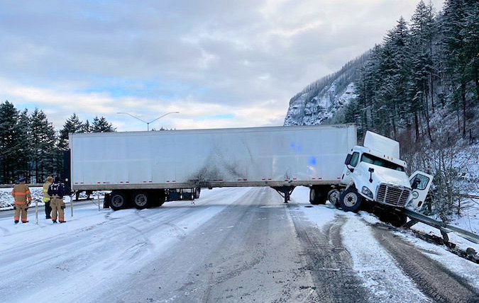 Eastbound Interstate 84 was closed by a jackknifed semi-truck near Corbett, east of Portland