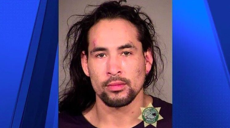 <i>Multnomah County Detention Center/KPTV</i><br/>Portland police say Brian D. Denault is in custody after using a van to ram into police vehicles before running away from officers on Wednesday.