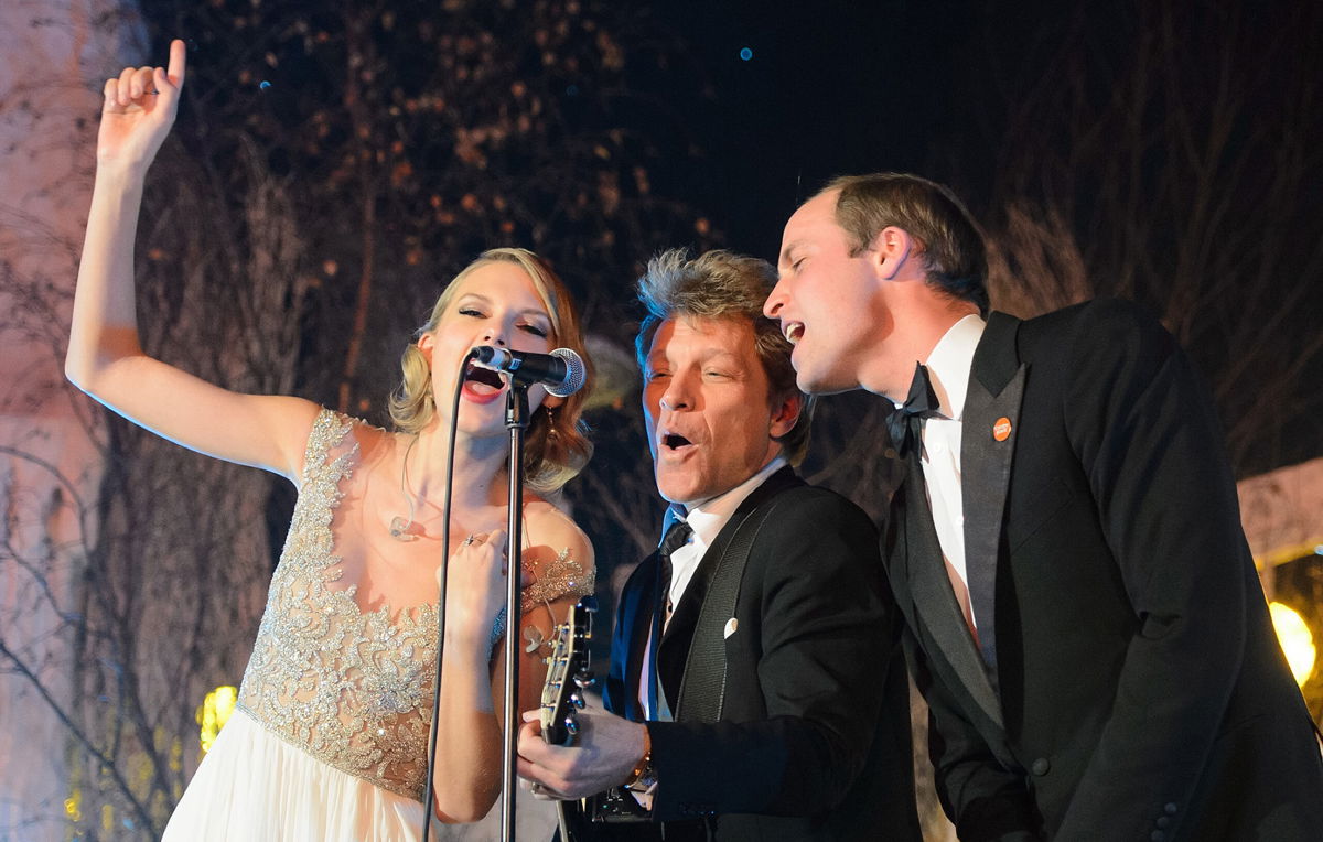 <i>Dominic Lipinski/AFP/Getty Images</i><br/>The Duke of Cambridge sings with Taylor Swift and Jon Bon Jovi at the Centrepoint Gala Dinner at Kensington Palace in London