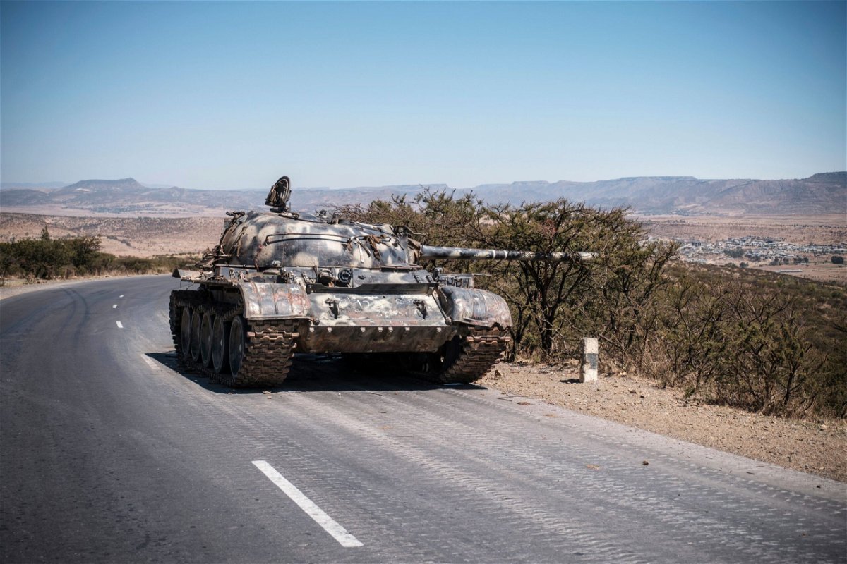 <i>EDUARDO SOTERAS/AFP/AFP via Getty Images</i><br/>A damaged tank stands on a road north of Mekele