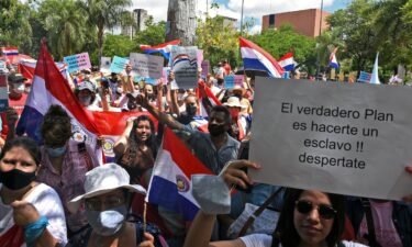 Activists from the Citizen Network for Childhood and Youth demonstrate outside the Paraguayan Congress in Asuncion last year.