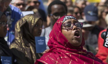 Deqa Dhalac speaks during a 2016 rally protesting comments by Donald Trump