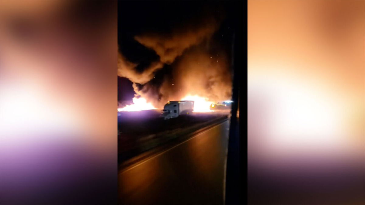 <i>courtesy Mike Olsen</i><br/>Icy conditions on I-94 cause crashes and vehicle runoffs in Wisconsin. Video from motorist Mike Olsen shows a large fire on I-94 early December 23 near Osseo