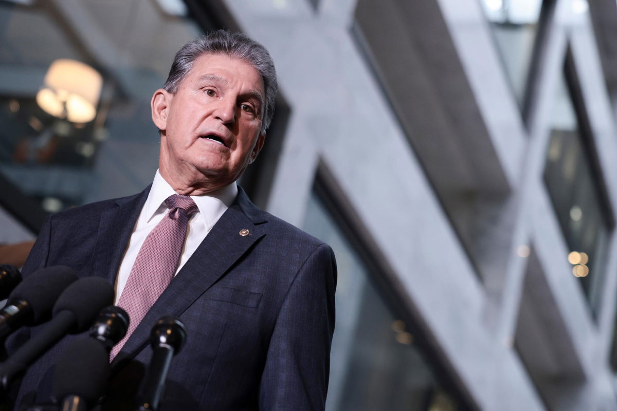 <i>Anna Moneymaker/Getty Images</i><br/>CBO issues score on how much Build Back Better would cost if programs were permanent. Sen. Joe Manchin is seen here on October 06 in Washington