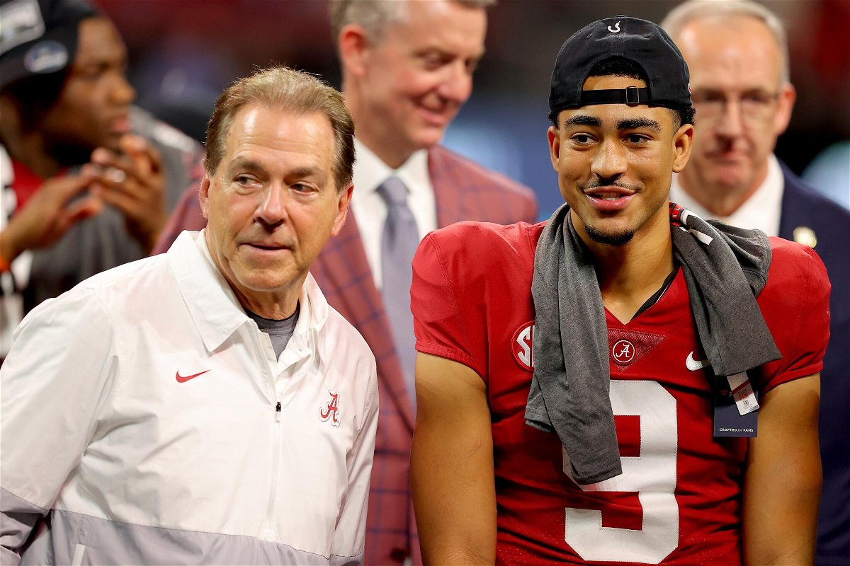 <i>Kevin C. Cox/Getty Images North America/Getty Images</i><br/>Alabama head coach Nick Saban (eft) and Bryce Young #9 celebrate their win against the Georgia Bulldogs in the SEC Championship game at Mercedes-Benz Stadium on December 4 in Atlanta