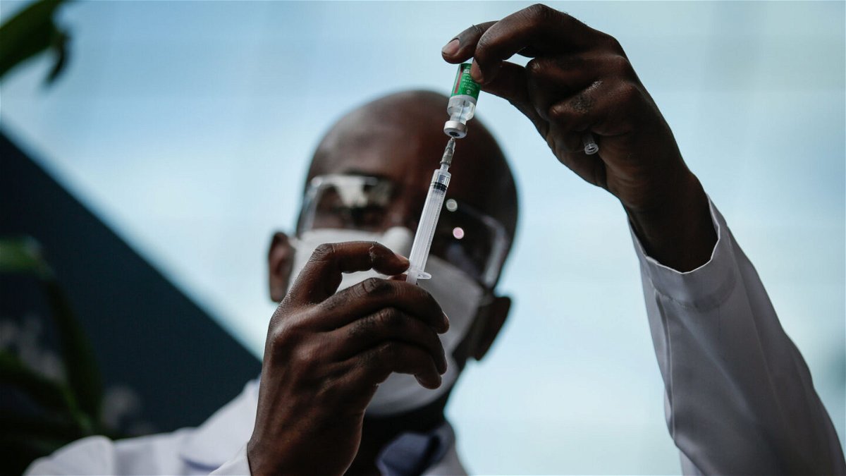 <i>Andre Coelho/Getty Images</i><br/>A healthcare worker prepares a dose of the AstraZeneca/Oxford vaccine before administering it to doctors at the Osvaldo Cruz Foundation (FIOCRUZ) on January 23