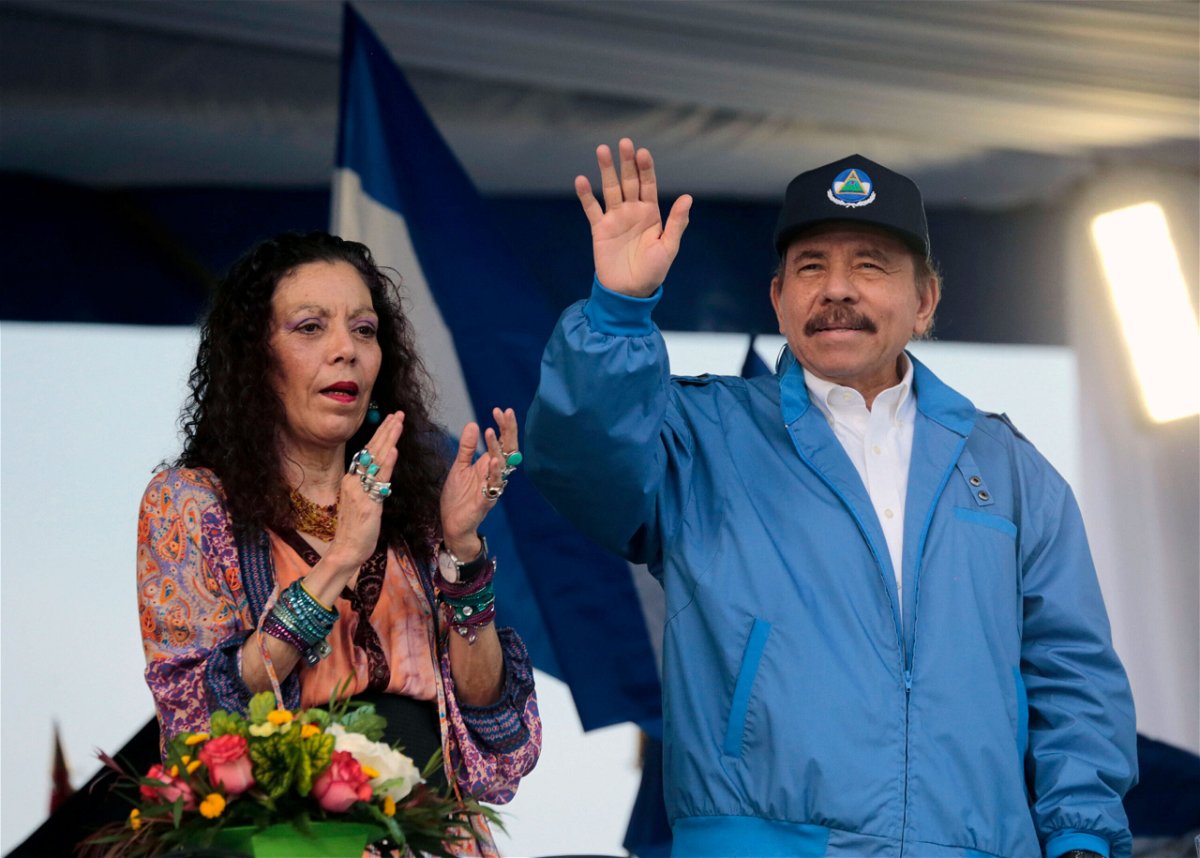 <i>Inti Ocon/AFP/Getty Images</i><br/>Nicaraguan President Daniel Ortega with his wife and Vice President Rosario Murillo on October 13