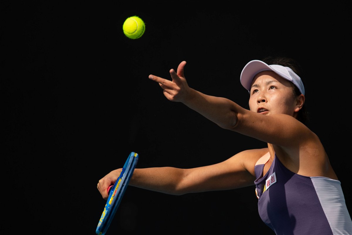 <i>Bai Xue/Xinhua/Getty Images</i><br/>Peng Shuai serves to Hibino Nao during their women's singles first-round match at the Australian Open in 2020.