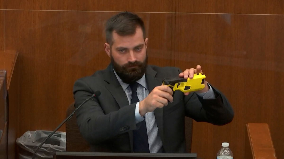 <i>Pool</i><br/>Special agent Sam McGinnis of the Minnesota Bureau of Criminal Apprehension explains the differences between Kim Potter's service weapon and a Taser.