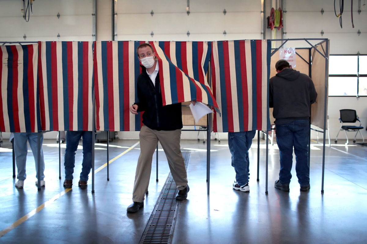 <i>Scott Olson/Getty Images</i><br/>Residents vote at the Town of Beloit fire station on November 03