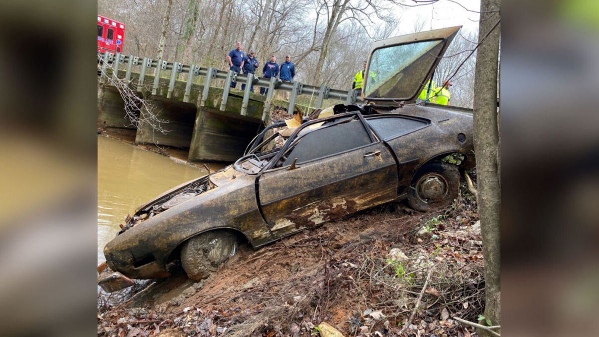 <i>Troup County Sheriff's Office</i><br/>Investigators pull a 1974 Ford Pinto from a creek in Alabama.