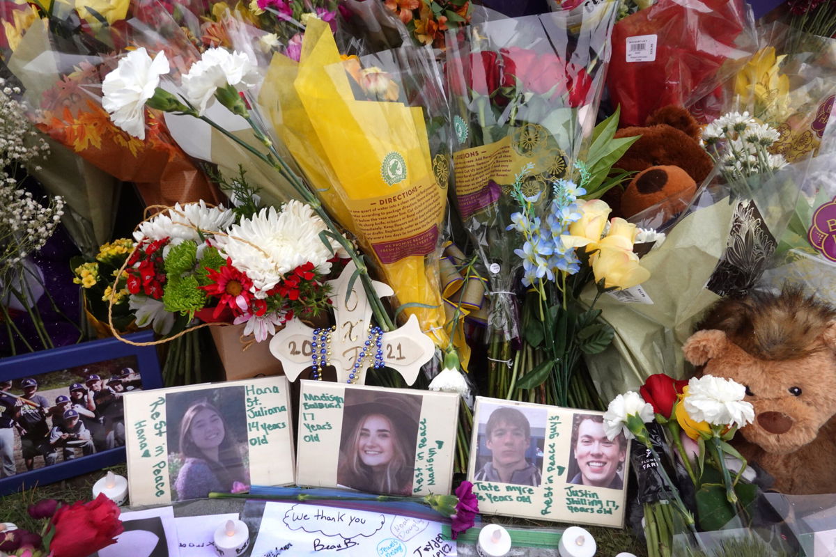 <i>Scott Olson/Getty Images</i><br/>A memorial outside of Oxford High School continues to grow on December 03