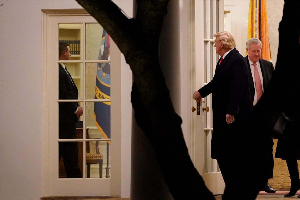 <i>Drew Angerer/Getty Images</i><br/>President Donald Trump and Chief of Staff Mark Meadows exit the Oval Office on January 4