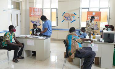Staff receive a Covid-19 vaccine at a hospital in South Sudan.