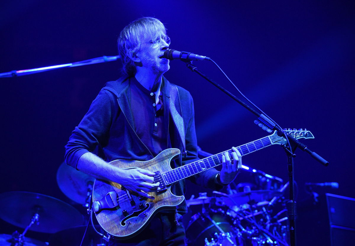 <i>Kevin Mazur/Getty Images North America/Getty Images for RLM</i><br/>Trey Anastasio of Phish performs in New York in 2019. The group has postponed their concerts next week.