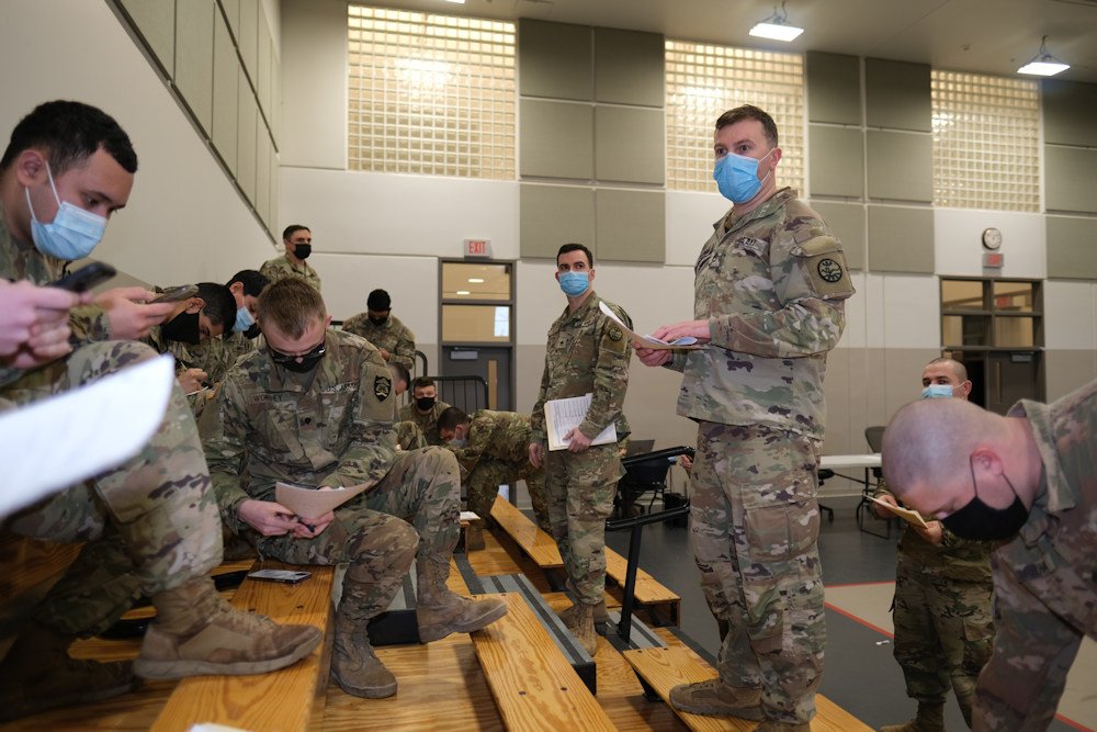 Oregon Army National Guard Staff Sgt. David Seymour, temporary hospital relief mission Regional Non-Commission Officer in Charge, from C Company, 3rd Battalion, 116 Cavalry Brigade, informs Soldiers of mission requirements Wednesday at the Anderson Readiness Center in Salem