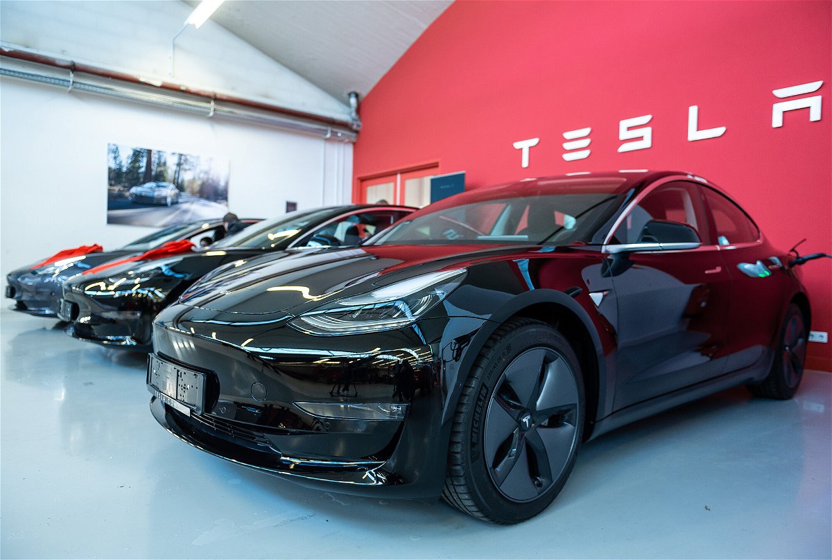 <i>Silas Stein/dpa/picture alliance/Getty Images</i><br/>Tesla reported earnings that more than tripled year-ago results