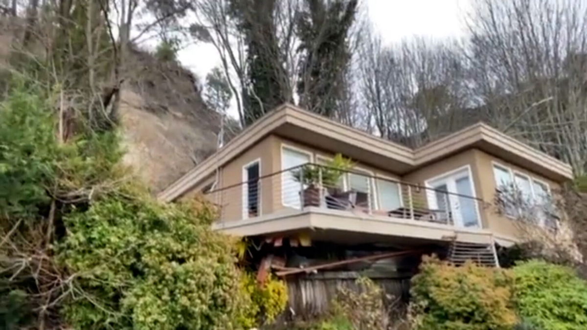 <i>Seattle Fire Department</i><br/>Seattle firefighters rescued a man trapped in the basement of his house during a landslide.