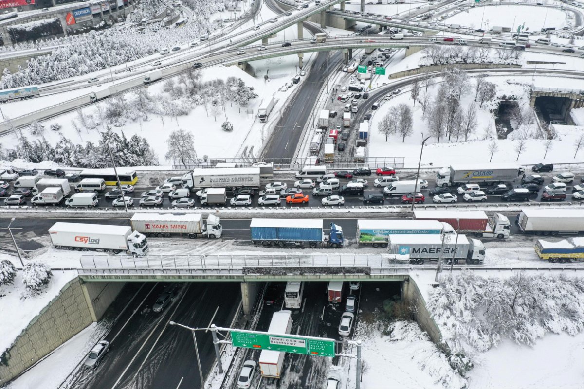 <i>Muhammed Enes Yildirim/Anadolu Agency/Getty Images</i><br/>Vehicles stuck on a snow-covered road after heavy snowfall hit Istanbul.