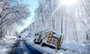 A fire engine rests on the side of the road after sliding off during icy conditions in Stafford County