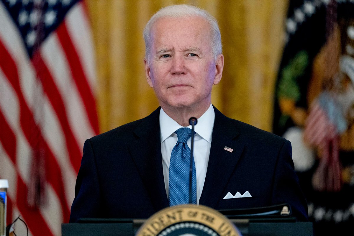<i>Andrew Harnik/AP</i><br/>President Joe Biden listens to reporter's questions during a meeting on efforts to lower prices for working families
