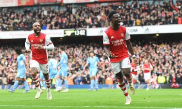 Bukayo Saka celebrates after giving Arsenal the lead against Manchester City.