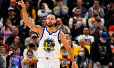 Stephen Curry of the Golden State Warriors celebrates a three-point shot during the second half of a game against the Utah Jazz at Vivint Smart Home Arena on January 1