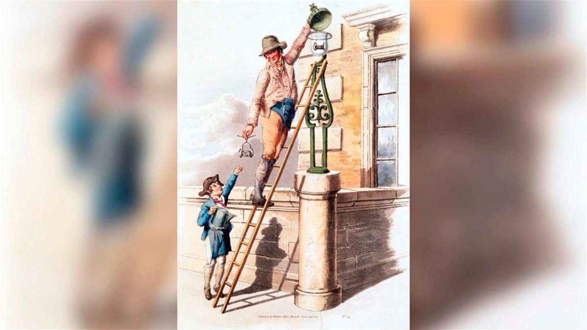 <i>SSPL/Getty Images</i><br/>The image shows a lamplighter up a ladder. British streets were lit by oil lamps until the introduction of gas lighting around 1807.