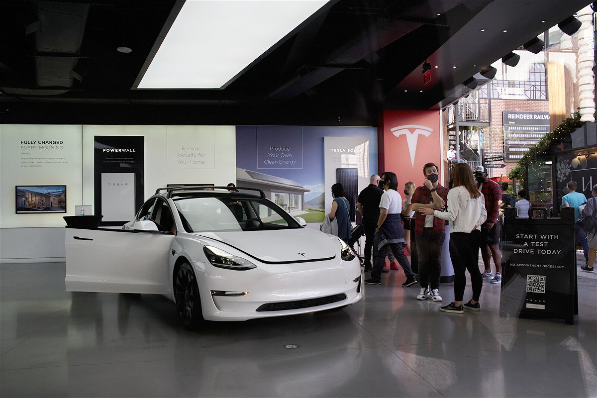 <i>Bing Guan/Bloomberg/Getty Images</i><br/>Tesla bucked the industry-wide trend of reduced sales due to the shortage of computer chips and other parts