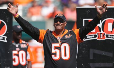 Browner waves to the crowd during a halftime ceremony of an NFL football game between the Bengals and the Baltimore Ravens on September 10