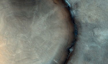 Rings in "tree stump'"crater found on Mars illuminate red planet's past climate.