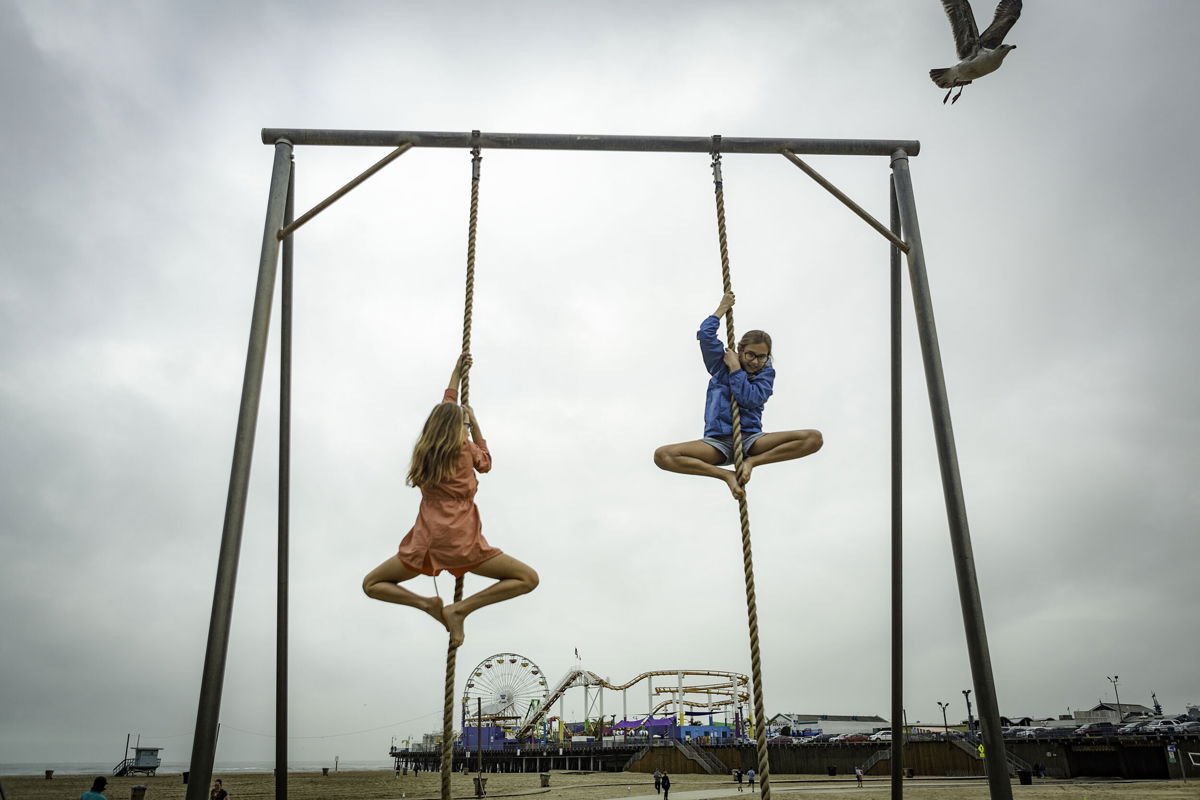 <i>Nancy Richards Farese</i><br/>Two children climbing on ropes in California