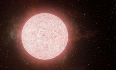 This artist's impression shows a red supergiant star releasing a gas cloud in the final year of its life.