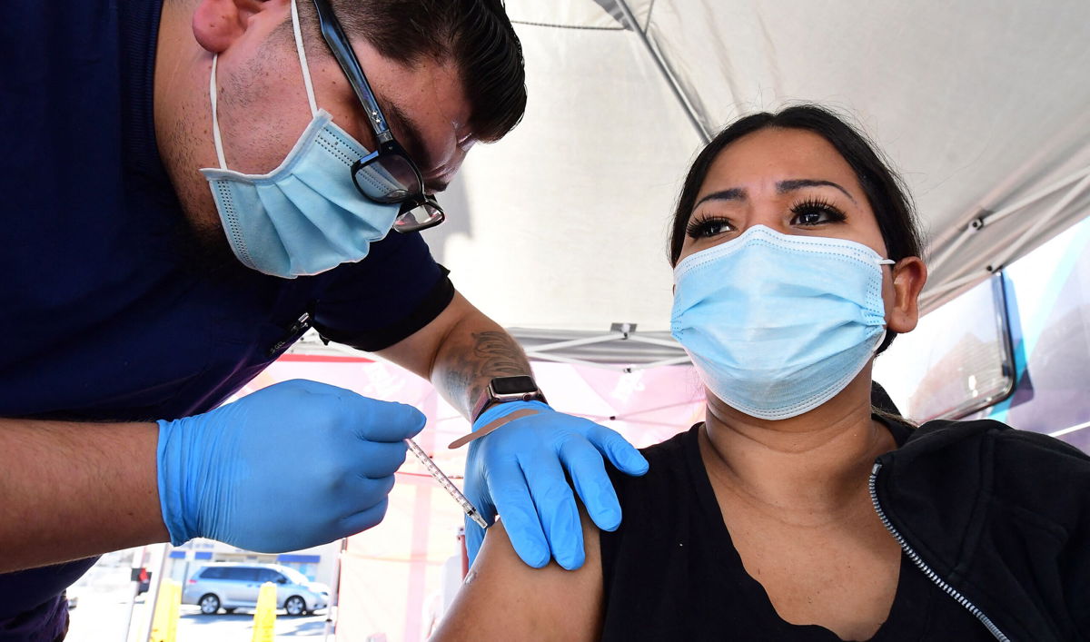 <i>Frederic J. Brown/AFP/Getty Images</i><br/>After getting a dose of Covid-19 vaccine