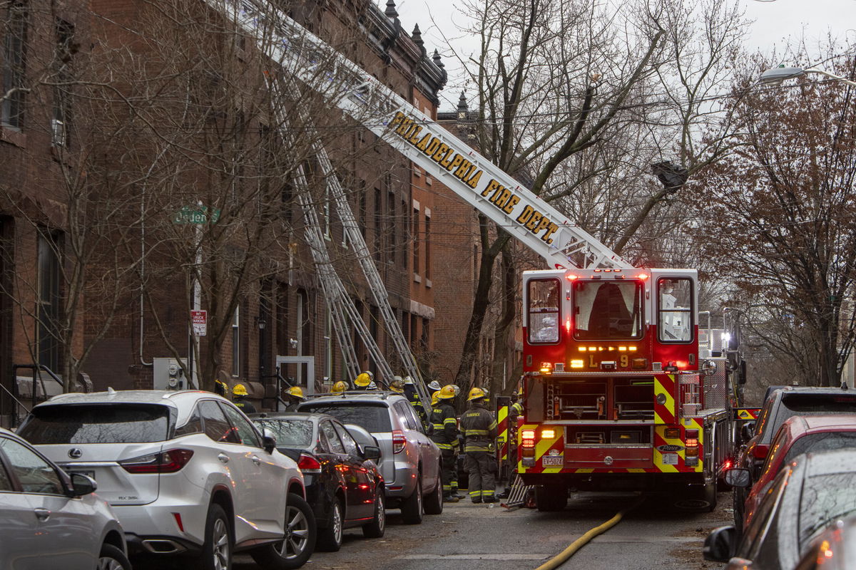 <i>Alejandro A. Alvarez/Philadelphia Inquirer/AP</i><br/>The Philadelphia Fire Department works at the scene of a deadly row house fire in Philadelphia on Wednesday.