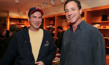 Norm Macdonald and Bob Saget at a book signing in Los Angeles