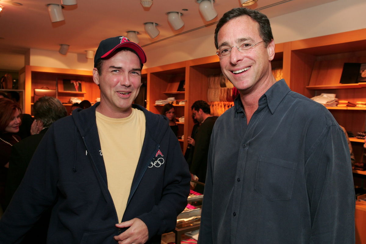 <i>Eric Charbonneau/Bei/Shutterstock</i><br/>Norm Macdonald and Bob Saget at a book signing in Los Angeles