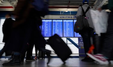Thousands of US flights were canceled on New Year's Day as a combination of Covid-19 and wintry weather have slowed travel
