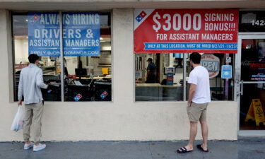 Domino's will pay you $3 to not get your pizza delivered. Customers here wait for their Dominos pizza orders on November 5