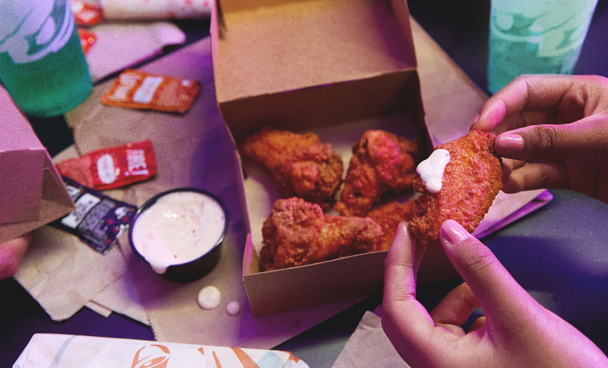 <i>Taco Bell</i><br/>At Taco Bell $5.99 price gets you five bone-in wings that are coated in a queso seasoning and served with a spicy ranch dipping sauce.