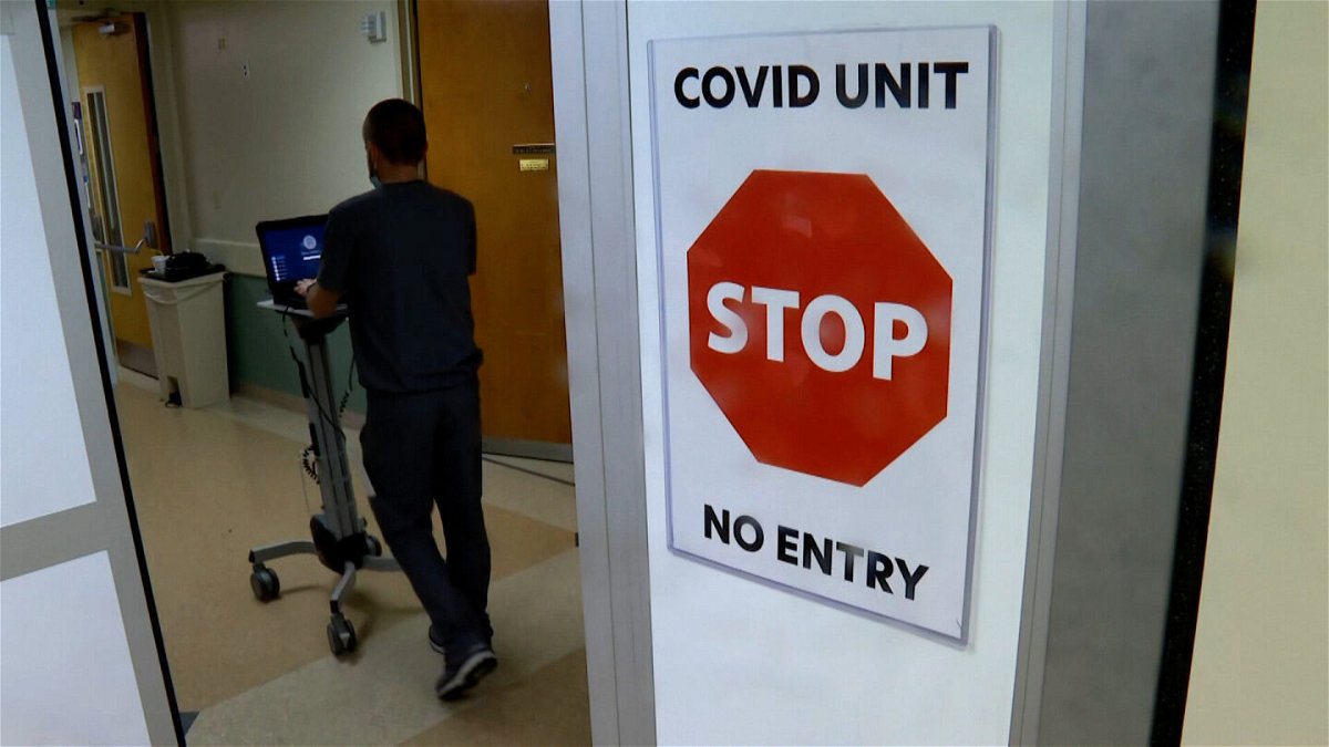<i>CNN</i><br/>A sign warning of a Covid Unit is displayed in a Kentucky hospital.