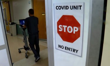 A sign warning of a Covid Unit is displayed in a Kentucky hospital.
