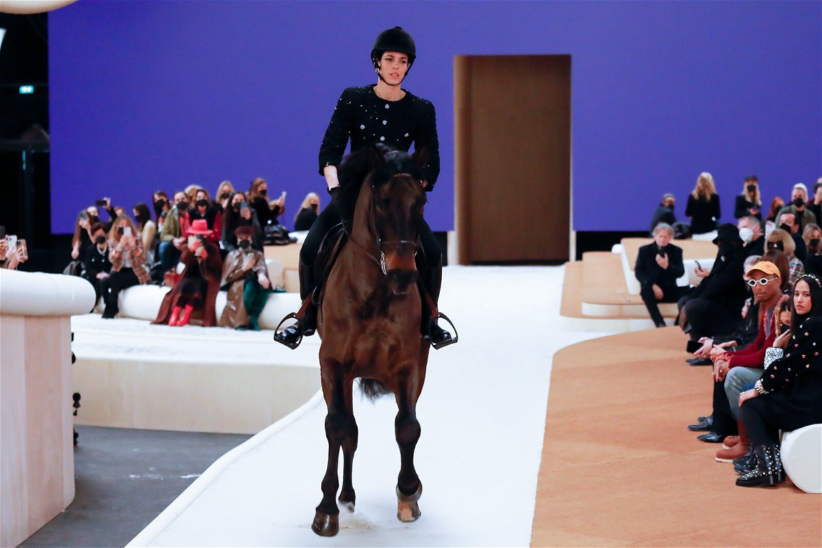 <i>Stephane Cardinale/Corbis/Getty Images</i><br/>Charlotte Casiraghi rides a horse on the runway during the Chanel Haute Couture Spring/Summer 2022 show as part of Paris Fashion Week at Le Grand Palais Ephemere on January 25 in Paris